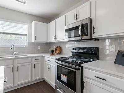 Small Kitchen White Cabinets.webp