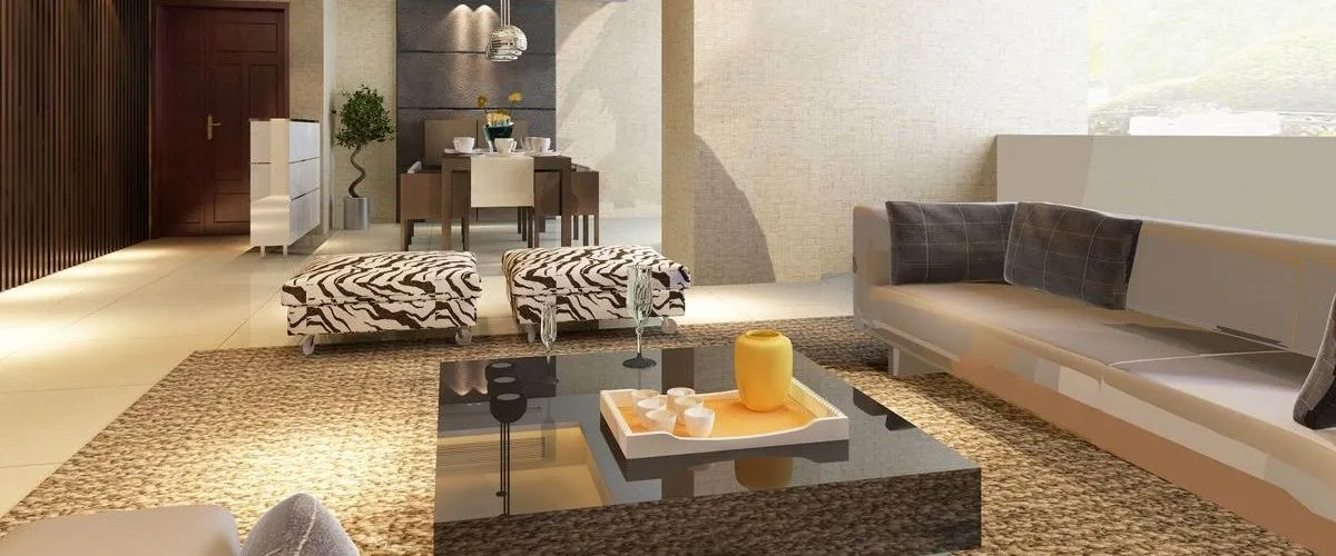 A bright, modern finished basement featuring an open-concept lounge with a sleek sofa, glossy coffee table, zebra-print ottomans, and an adjacent dining space.